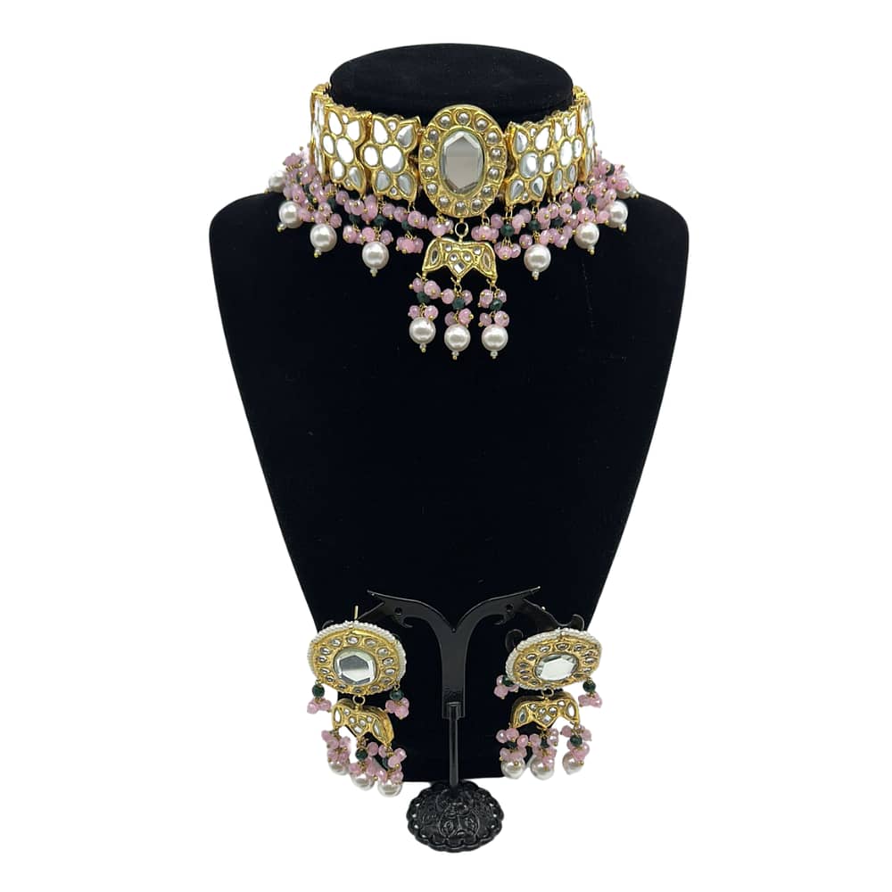 Kundan choker set with pearls and pink finish.