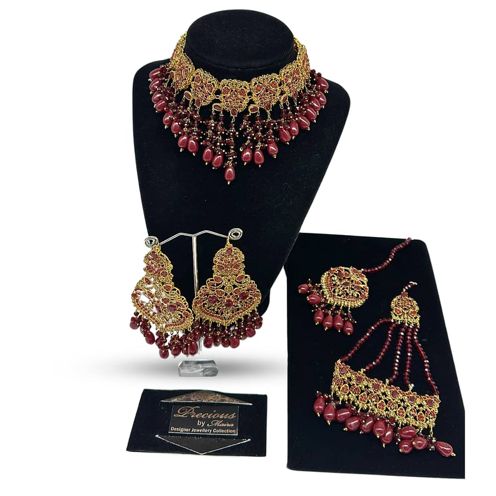 Antique gold set with long hanging and traditional classic earrings and tikka