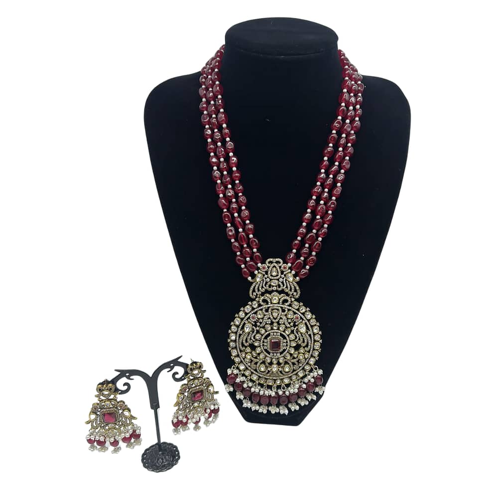 Victorian pendant set with ruby strands and pearls finish