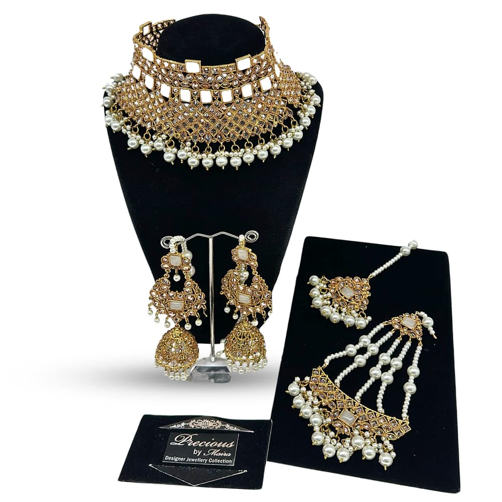 Polkee over-sized choker with beautiful jhumkey and tikka jhoomer in all pearls finish