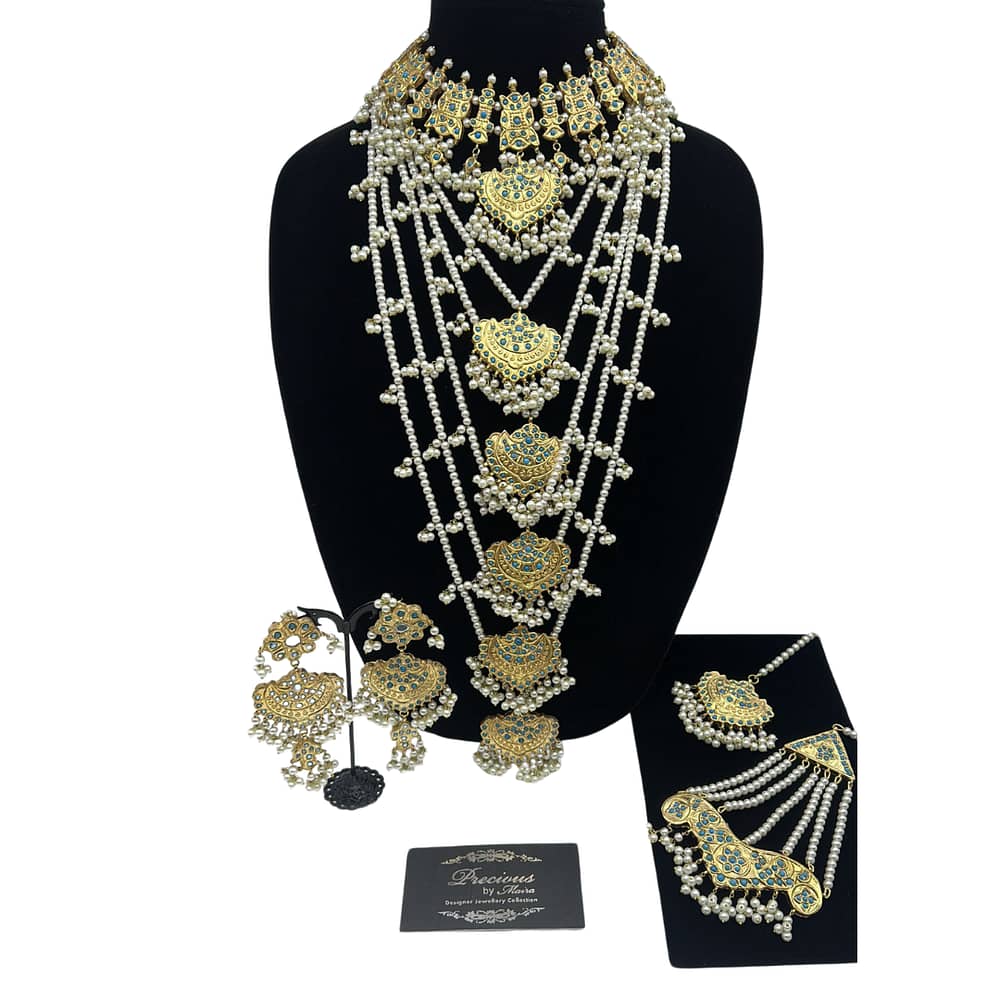 Traditonal classic kundan set with five layered Mala in pearls and feroza.