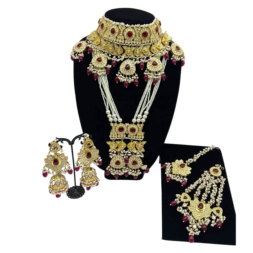 Statement kundan necklace in ruby with matching Mala, jhumkey style earrings, tikka and jhoomer with real pearls