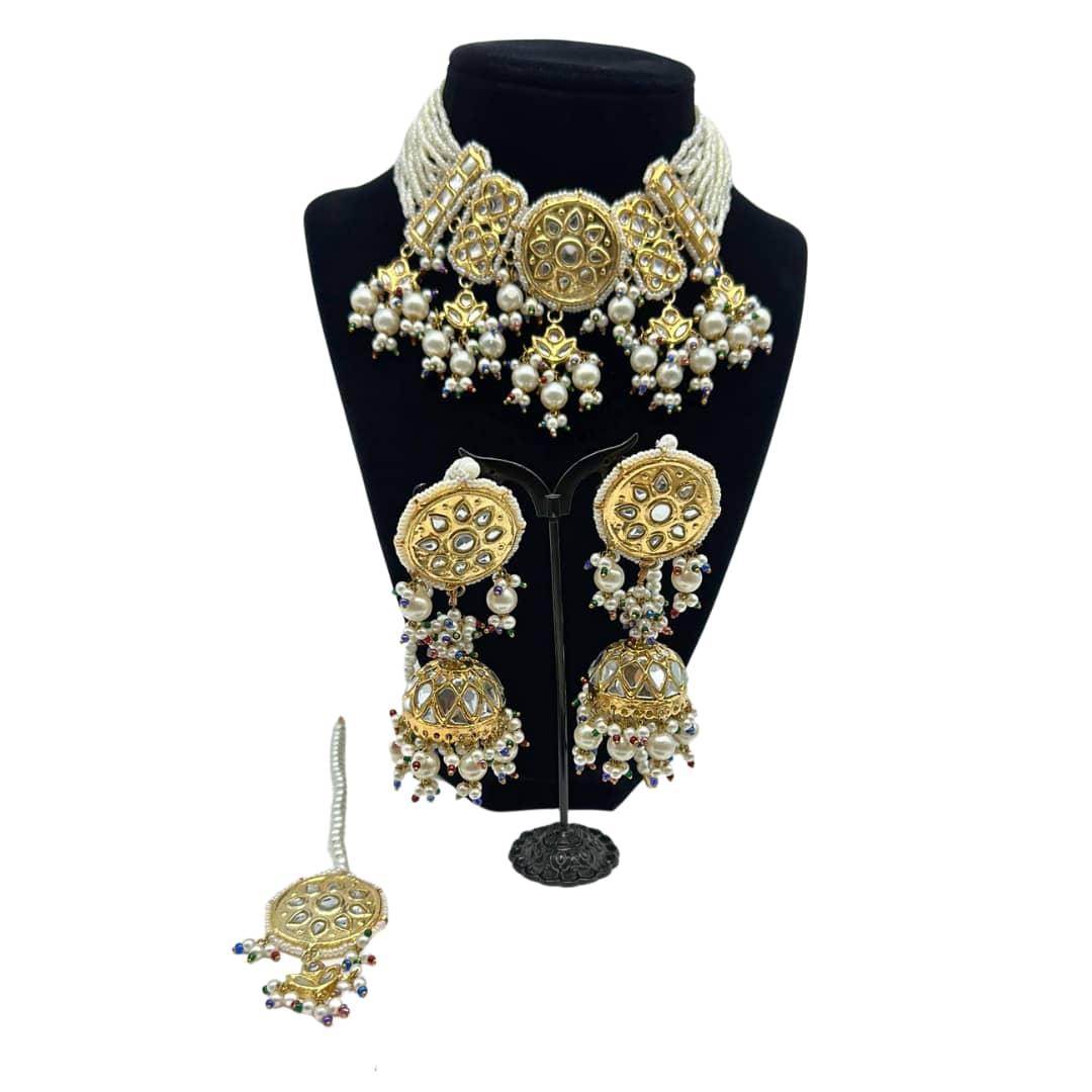 Kundan necklace with light jhumkey and matching tikka