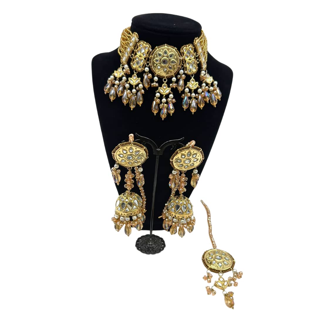 Kundan necklace set with light jhumkey and matching tikka