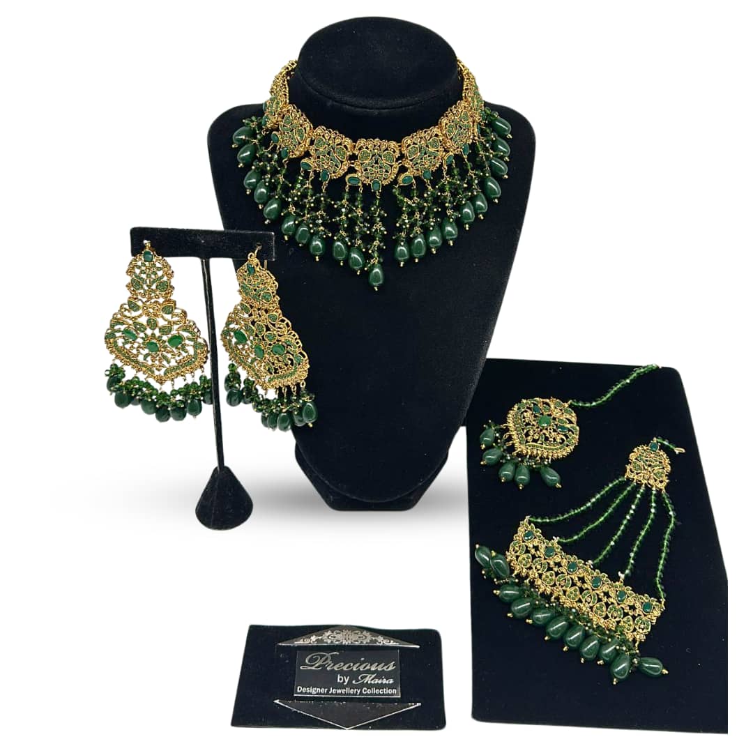 Antique gold set with emeralds finish and classic old style earrings and tikka