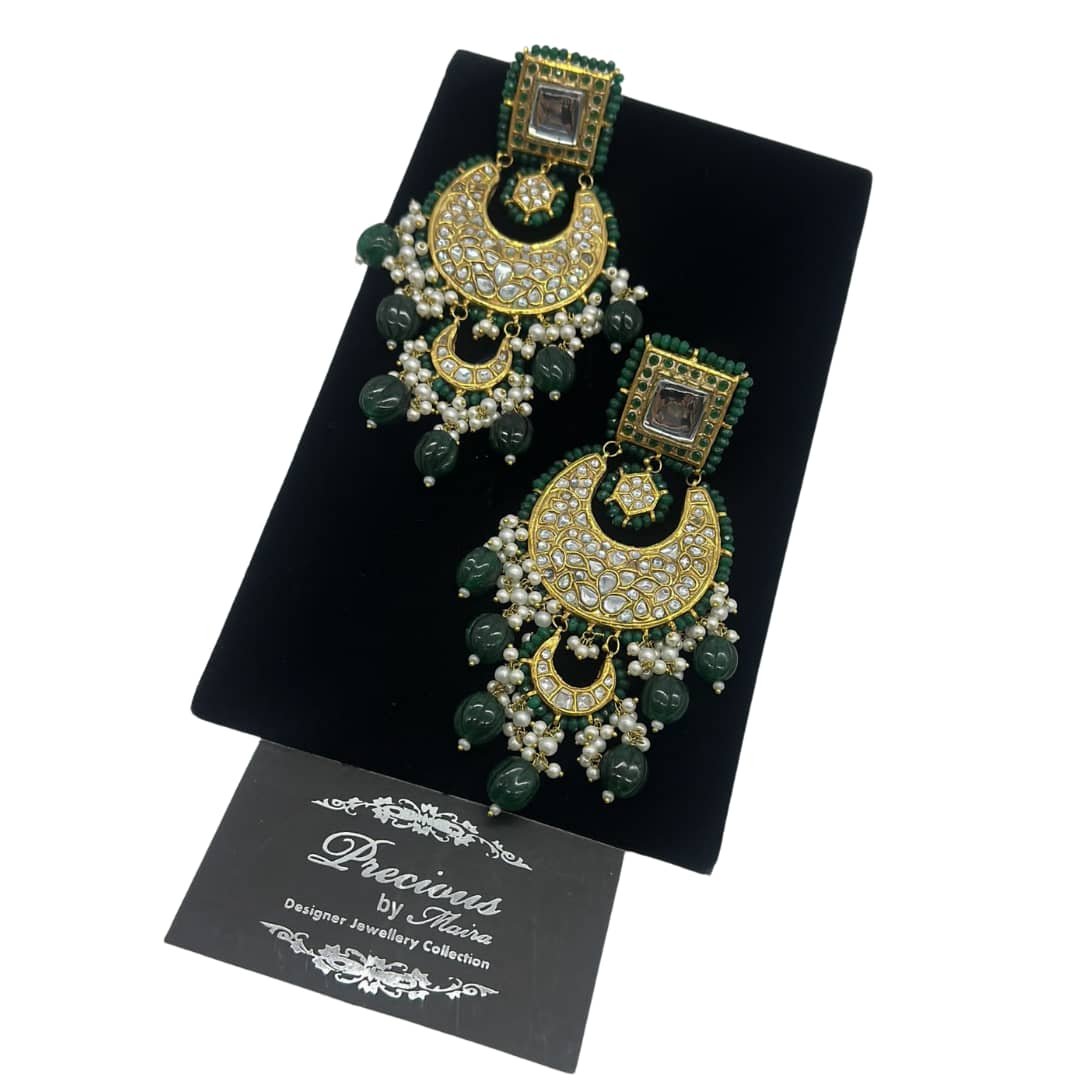 Kundan earrings with pearls and semi precious emeralds