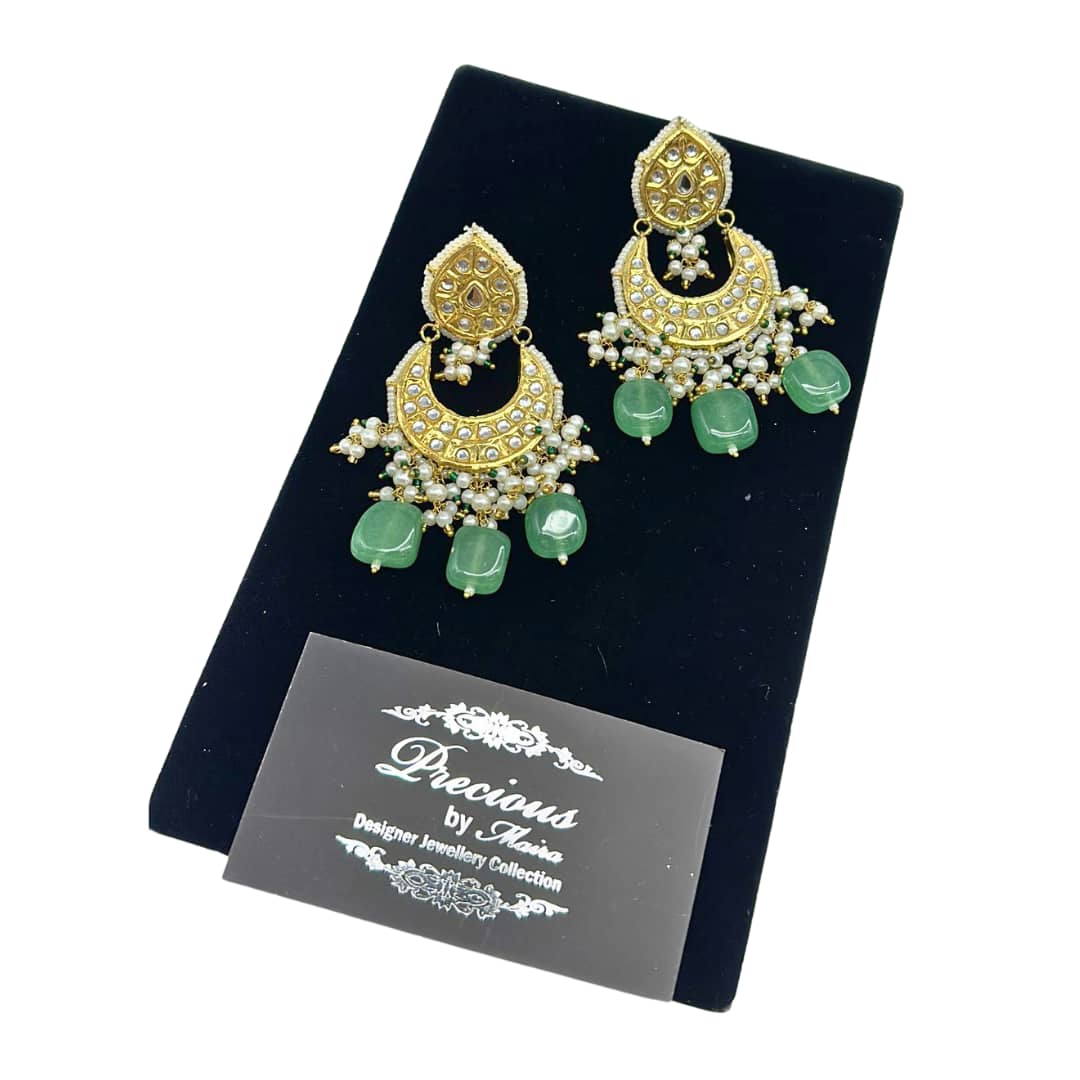 Kundan gold plated earrings with pearl hanging and emerald droplets