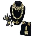 Kundan necklace meenakari border with long Mala and statement tikka. The set comes with two pairs of earrings and adjustable ring