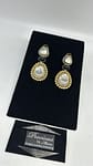 Statement uncut kundan earrings with Zirconia border and Sapphire main stone