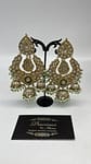 Statement uncut kundan earrings with hint of green