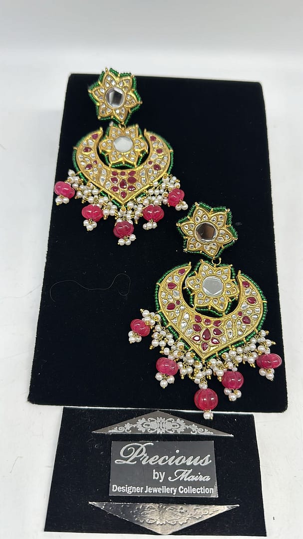 Kundan earrings in ruby and emeralds with pearl details