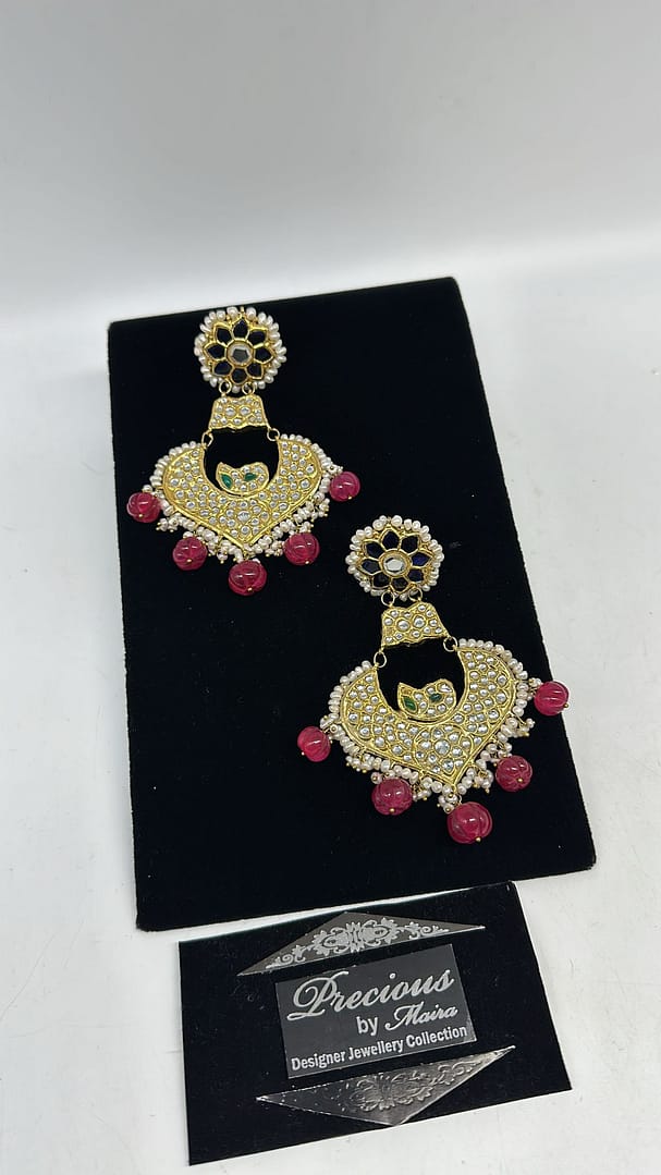 Kundan meena earrings with real pearls border and ruby droplets