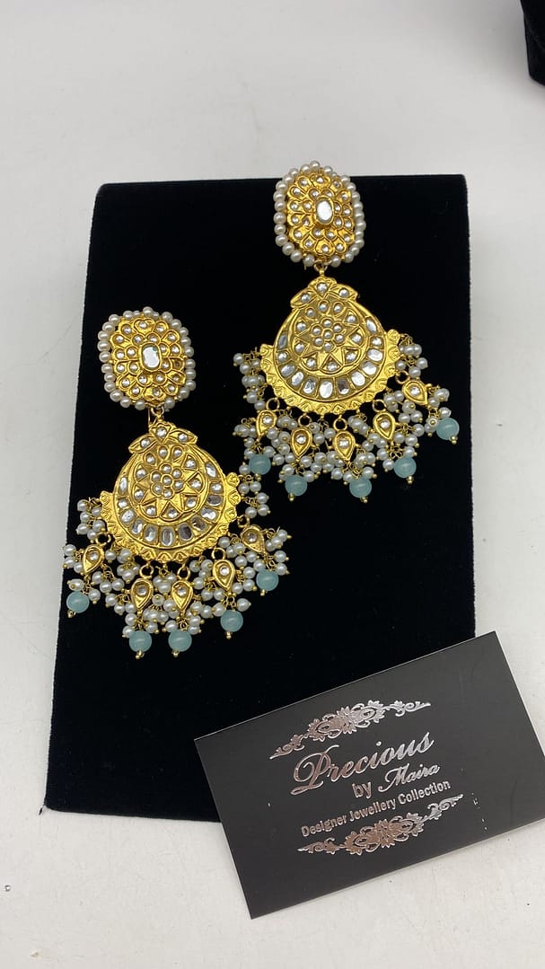 Kundan gold plated earrings with pearls finish and mint green droplets