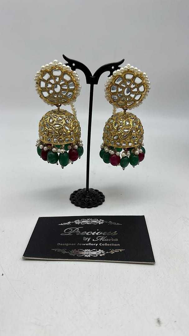 Kundan jhumkey with real pearls finish and ruby and emerald droplets