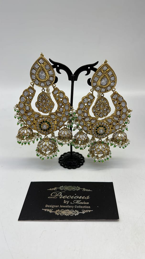 Statement uncut kundan earrings with hint of green